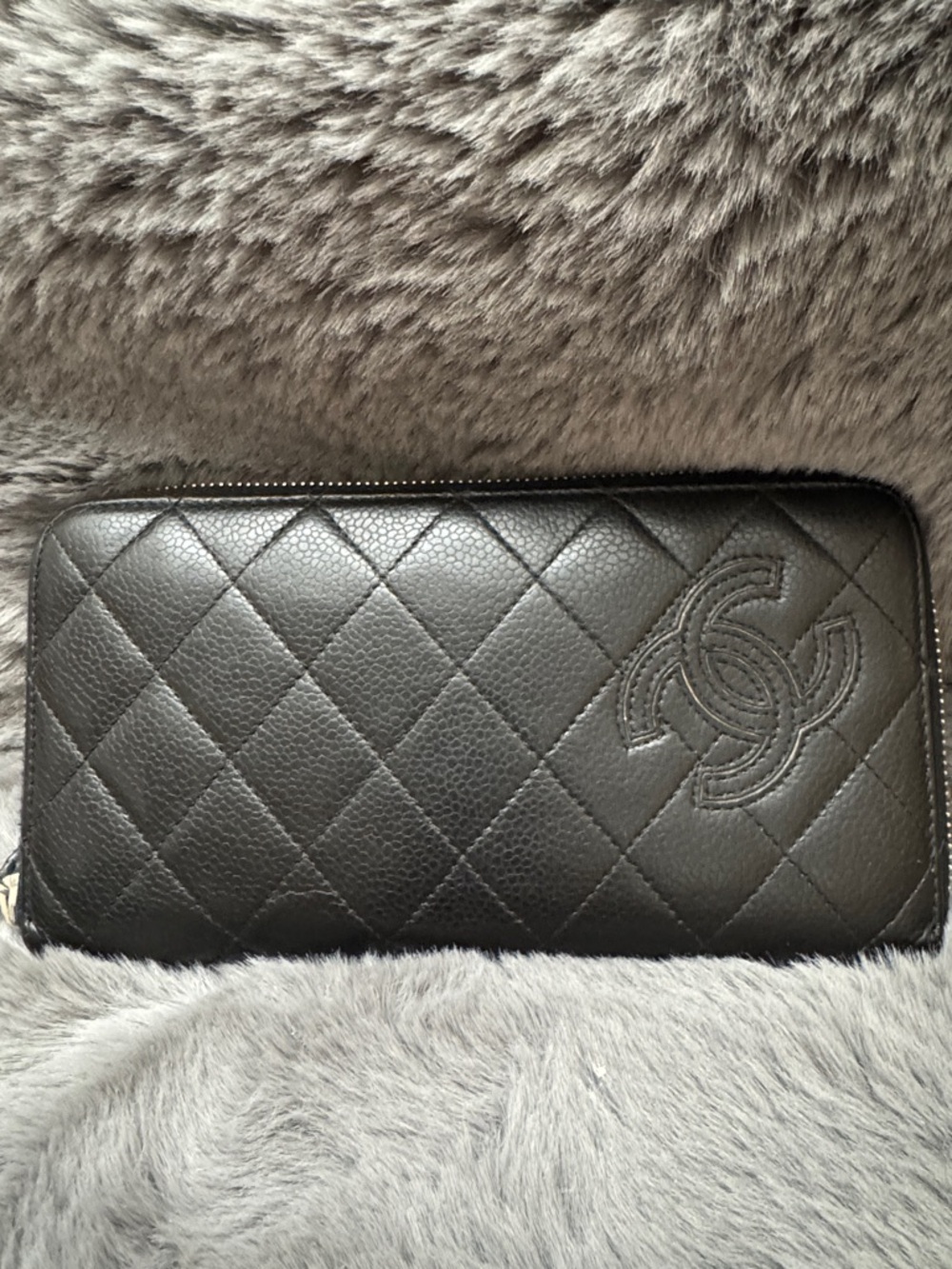 CHANEL Black Quilted Leather Zip Wallet with Embossed CC